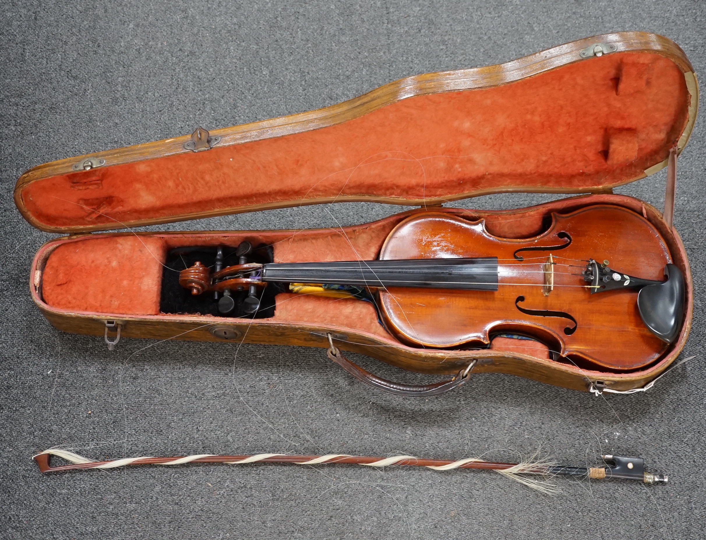 A 19th century violin with silver mounted bow and case, back measures 36cm CITES Submission reference JX7RJU7S
